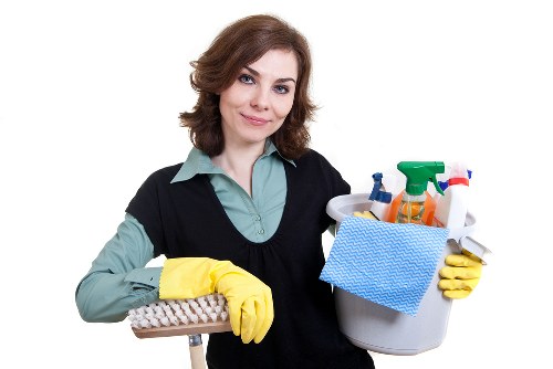 Technician cleaning delicate upholstery fabric